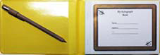 yellow vinyl autograph book with pen